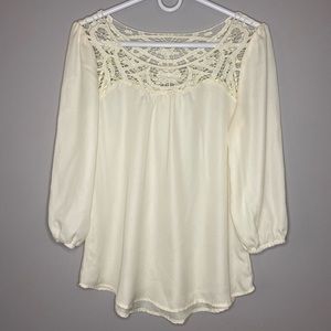 Women’s cream color blouse